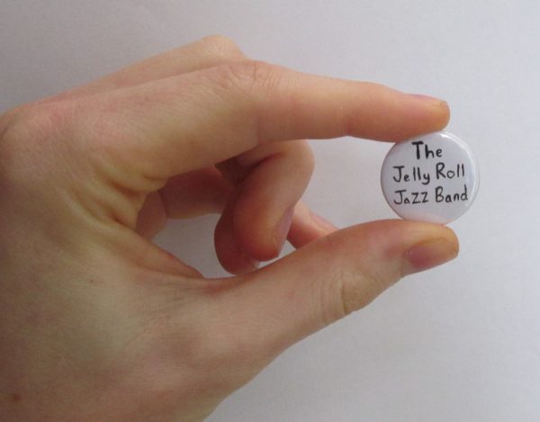 The Jelly Roll Jazz Band Badge in hand