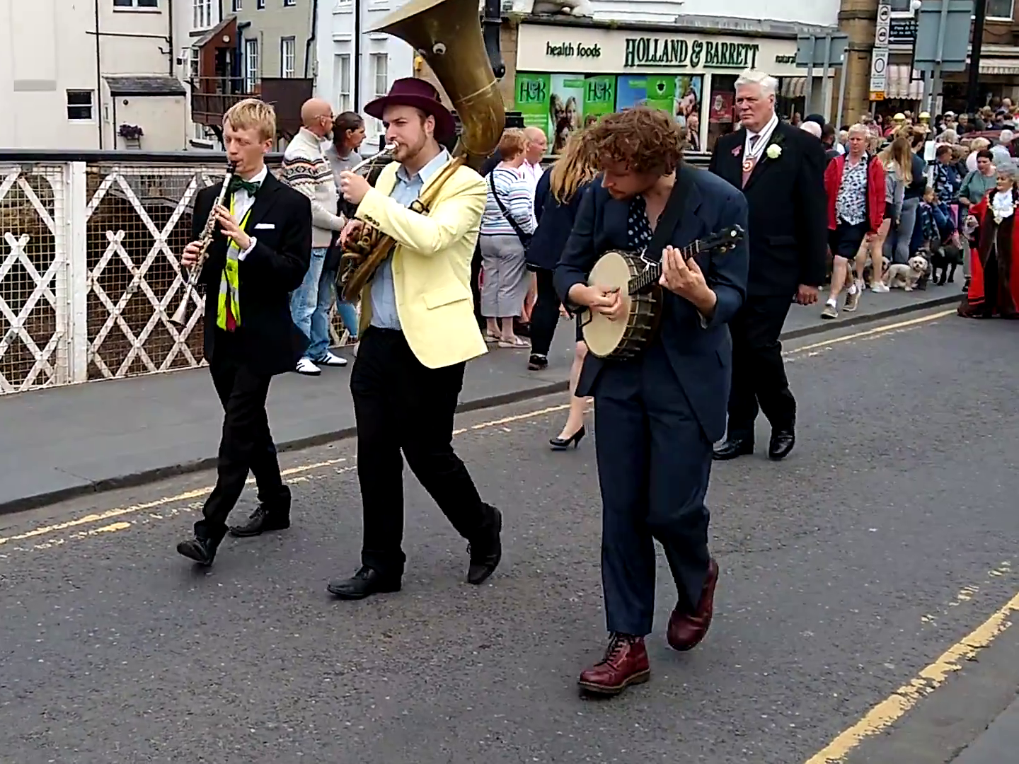 The Jelly Roll Jazz Band leading three busfuls of dignitaries through Whitby, at their 2019 Yorkshire Day parade